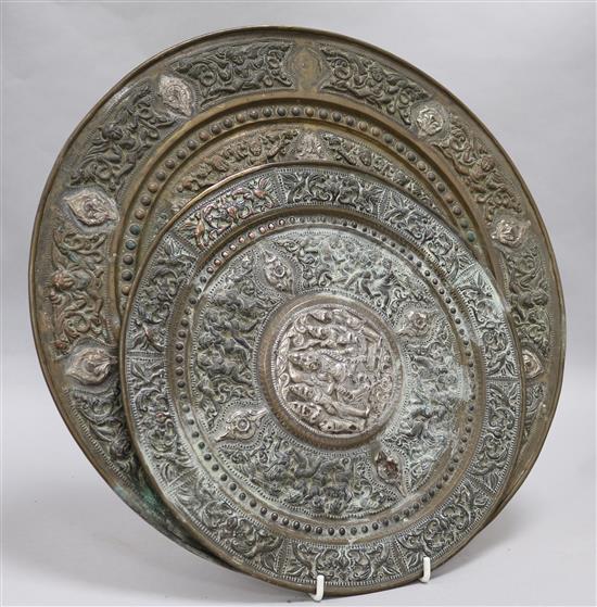 Two Himalayan Buddhist silver and brass circular plates